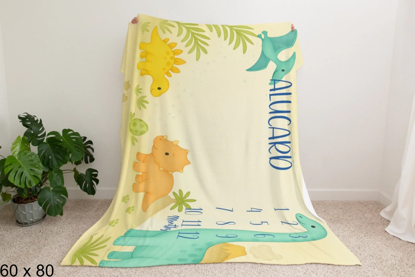 60x80_enchanted_forest_Man_Holding_Velveteen_Blanket_Mockup