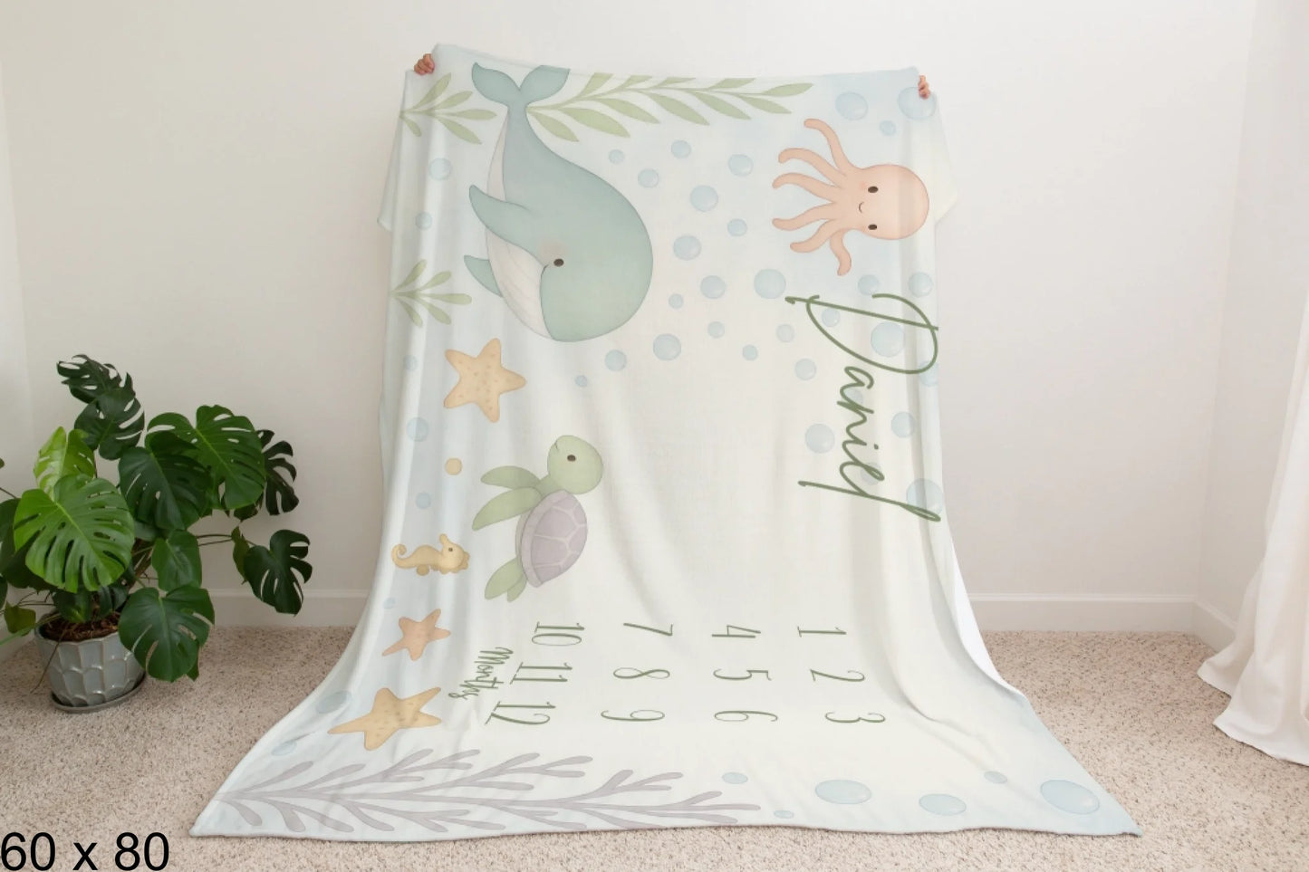 60x80_enchanted_forest_Man_Holding_Velveteen_Blanket_Mockup