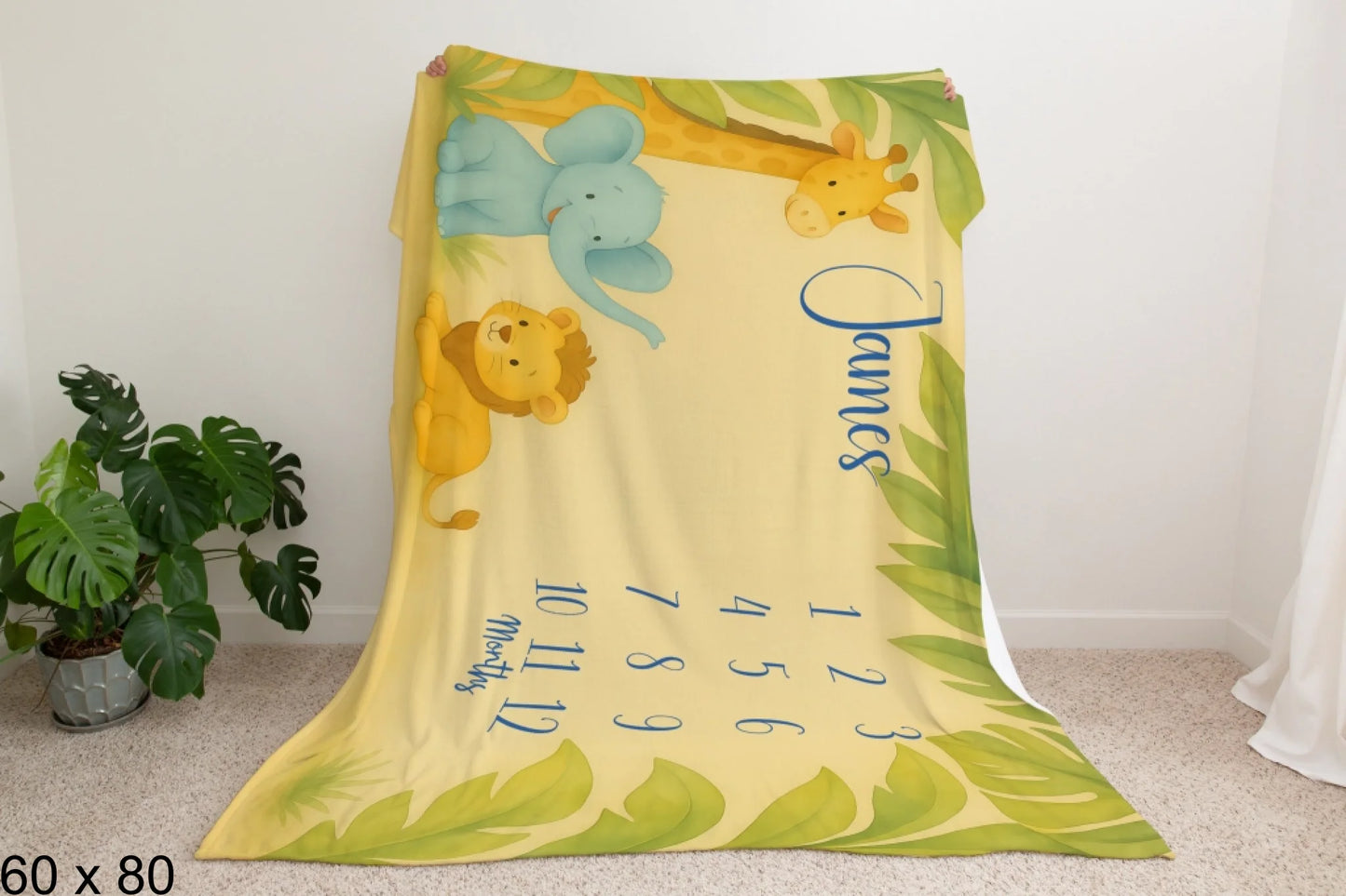 60x80_enchanted_forest_Man_Holding_Velveteen_Blanket_Mockup