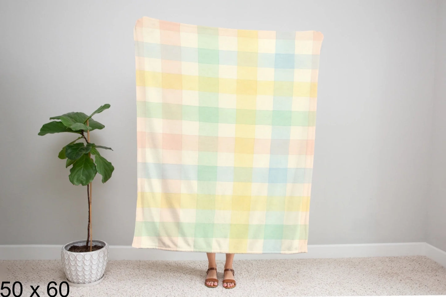 50x60_gingham_woman_holding_velveteen_blanket_mockup
