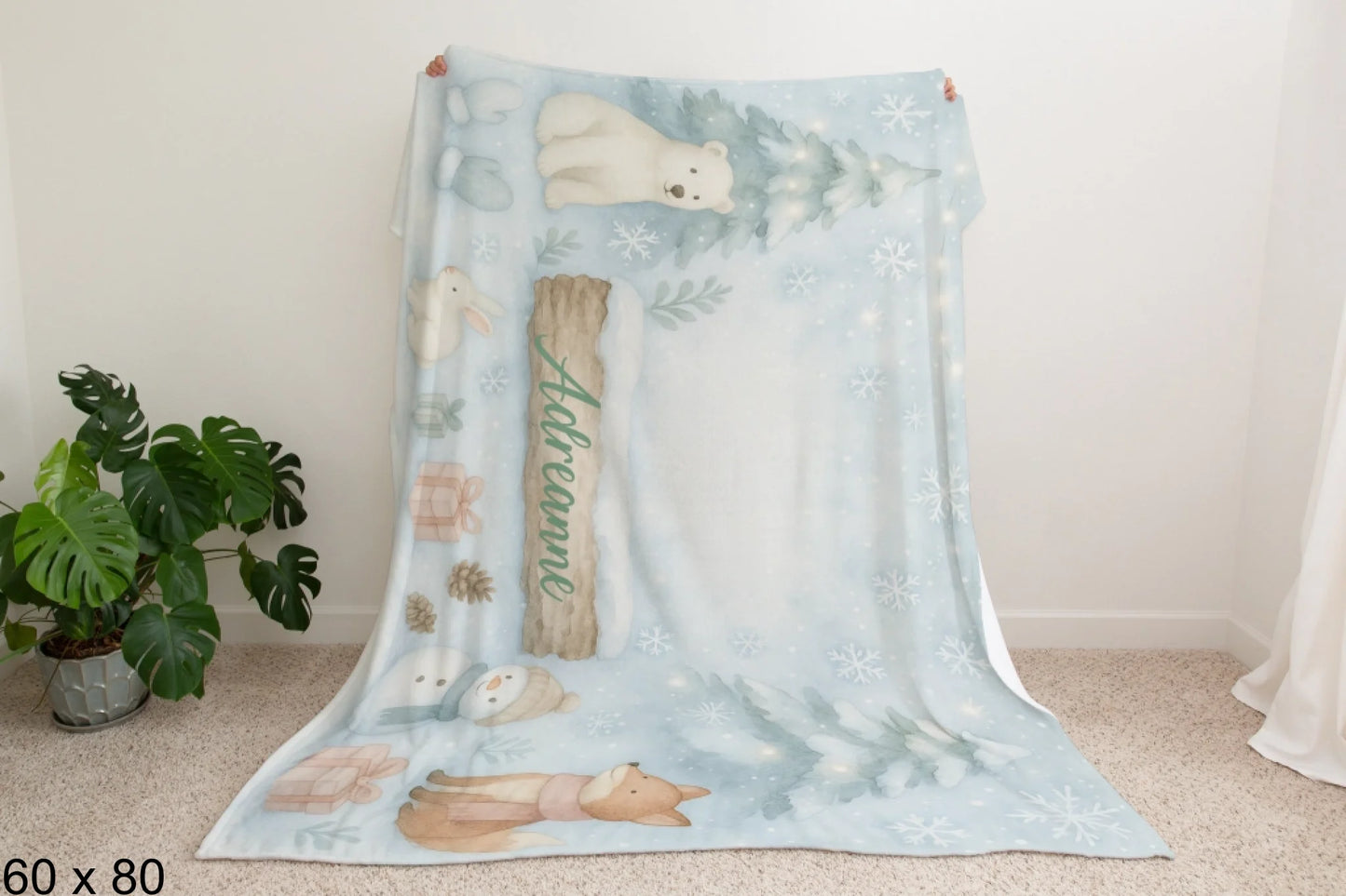 60x80_winter_wonderland_man_holding_velveteen_blanket_mockup