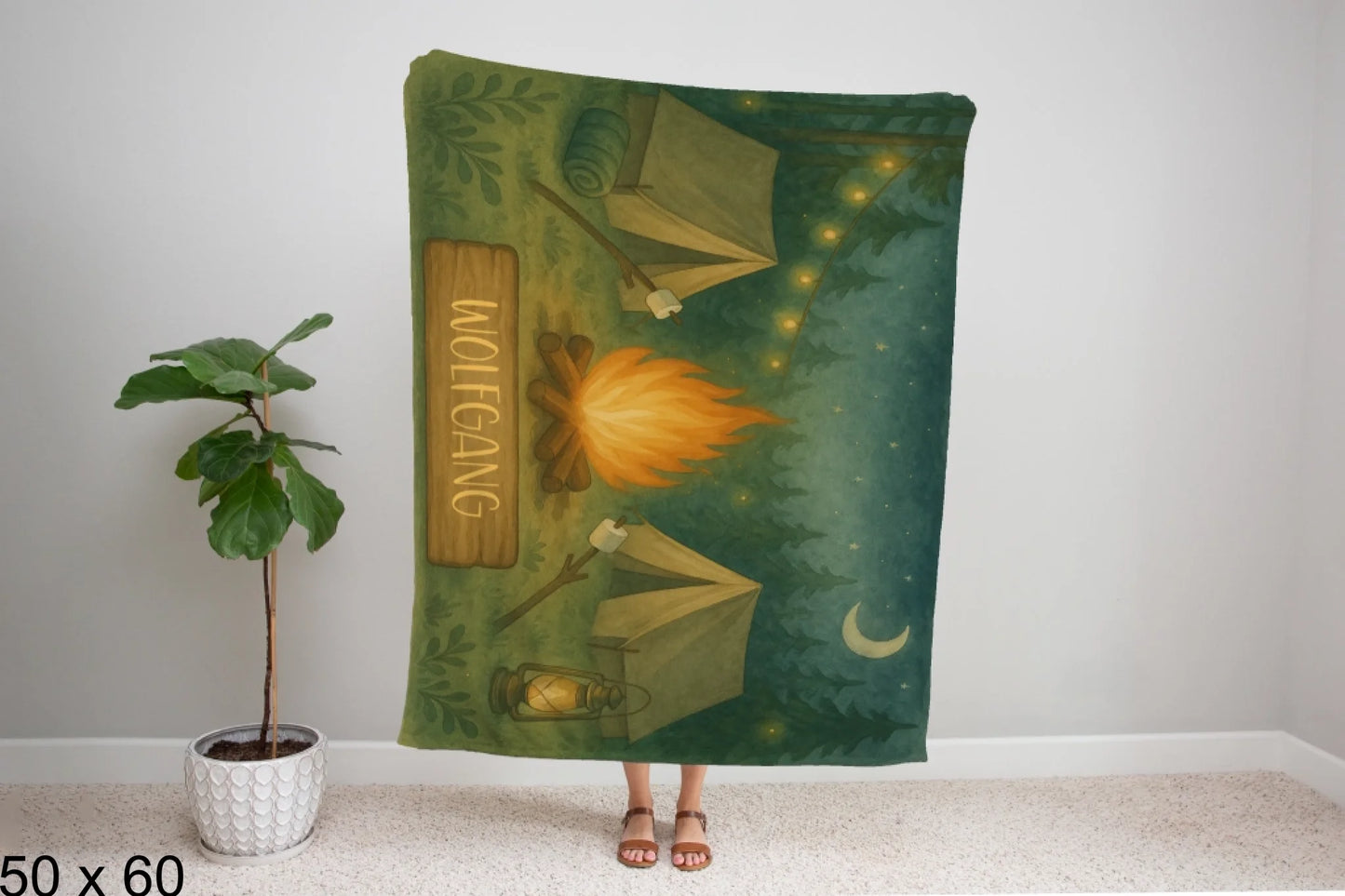 50x60_winter_wonderland_woman_holding_velveteen_blanket_mockup