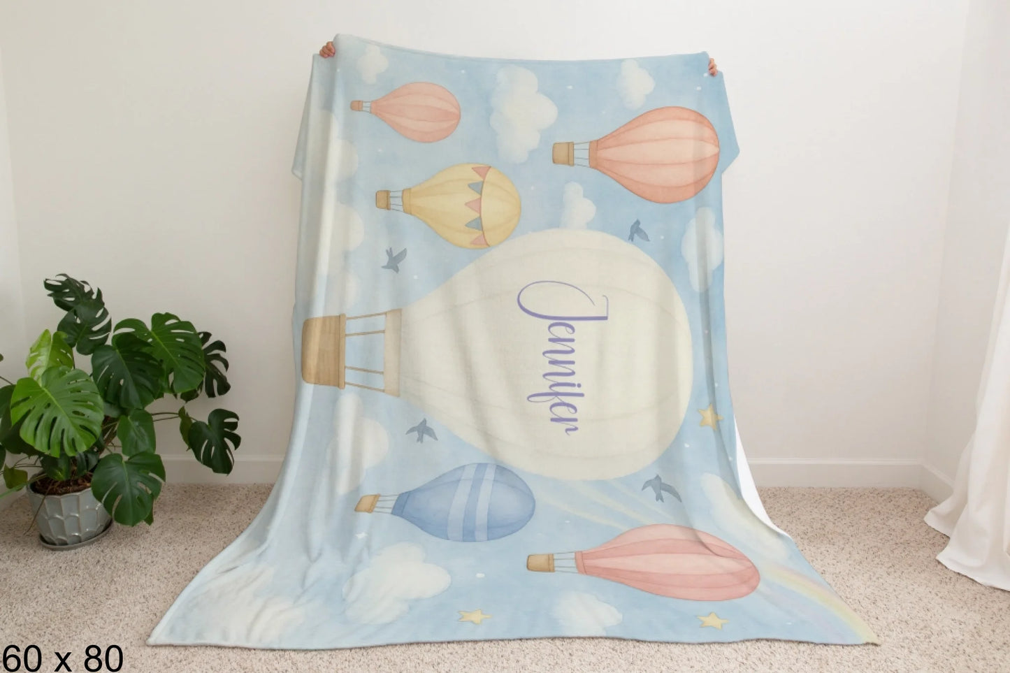 60x80_winter_wonderland_man_holding_velveteen_blanket_mockup