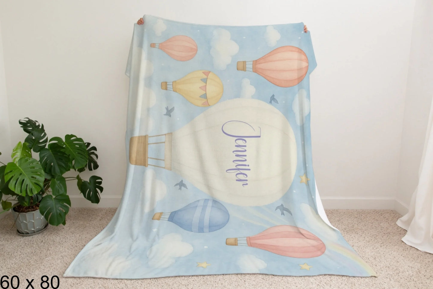 60x80_winter_wonderland_man_holding_velveteen_blanket_mockup