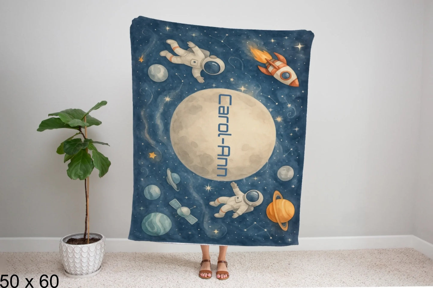 50x60_winter_wonderland_woman_holding_velveteen_blanket_mockup