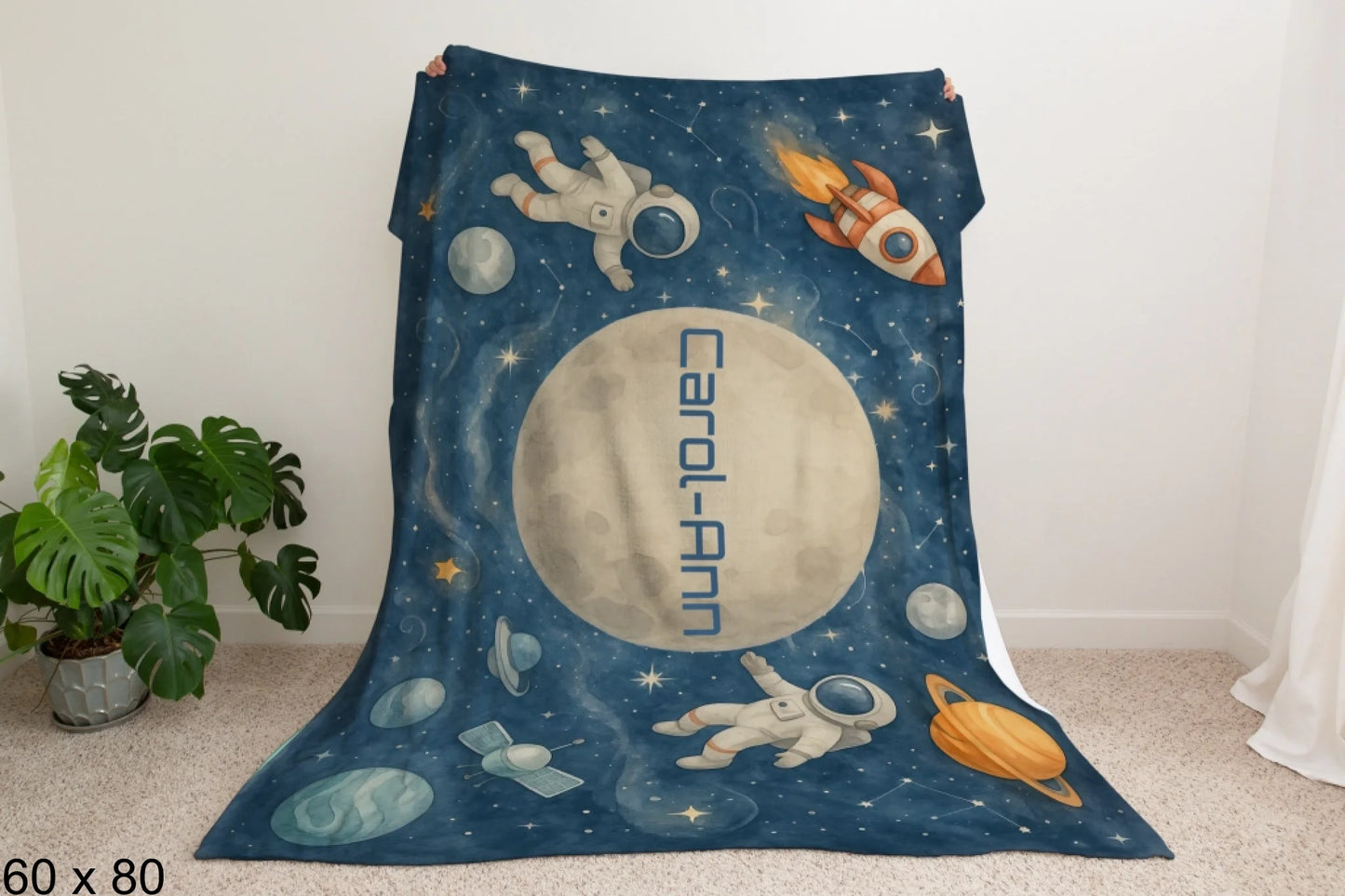 60x80_winter_wonderland_man_holding_velveteen_blanket_mockup