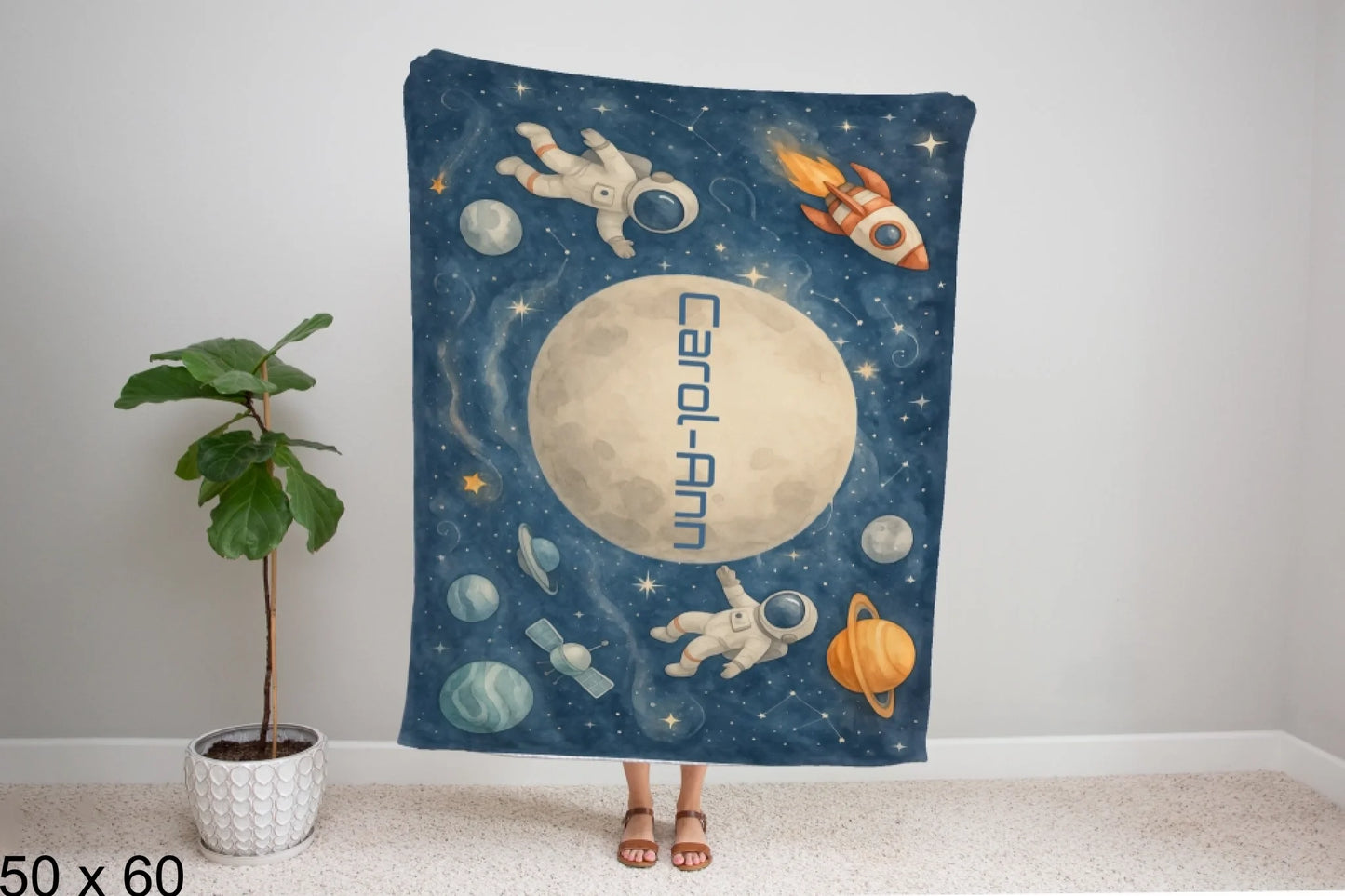 50x60_winter_wonderland_woman_holding_velveteen_blanket_mockup