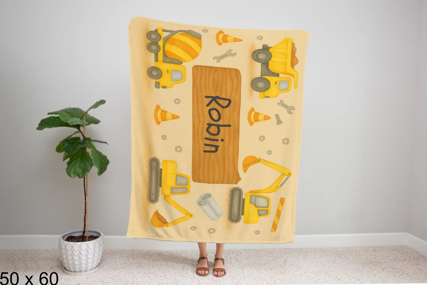 50x60_winter_wonderland_woman_holding_velveteen_blanket_mockup