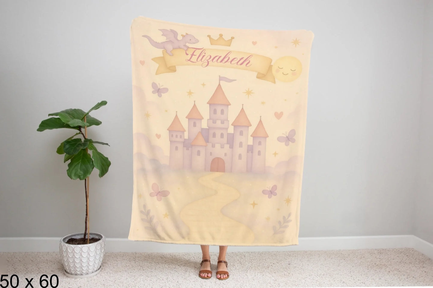 50x60_winter_wonderland_woman_holding_velveteen_blanket_mockup