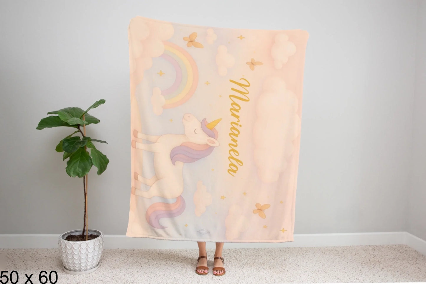 50x60_winter_wonderland_woman_holding_velveteen_blanket_mockup