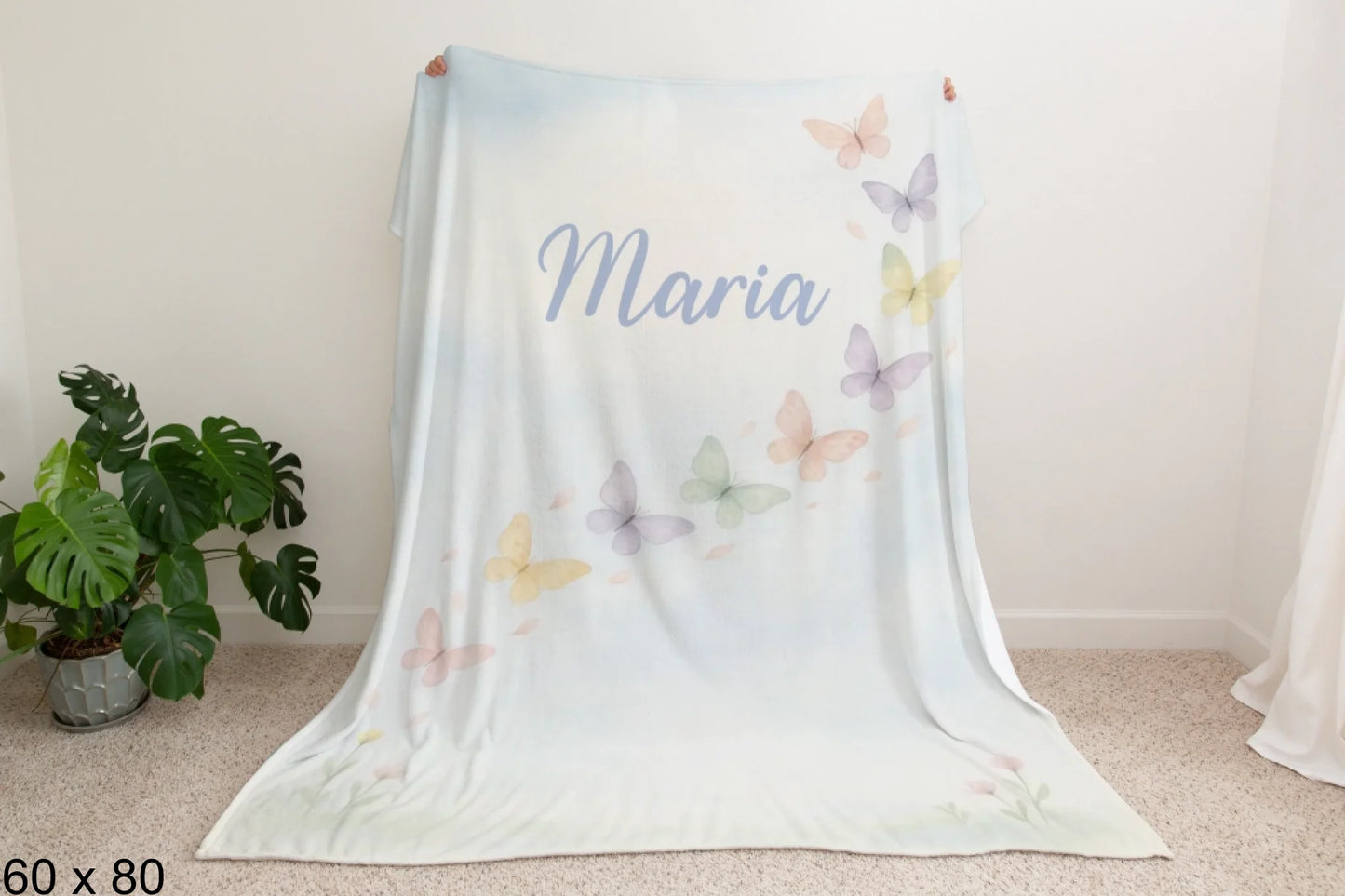 60x80_winter_wonderland_man_holding_velveteen_blanket_mockup