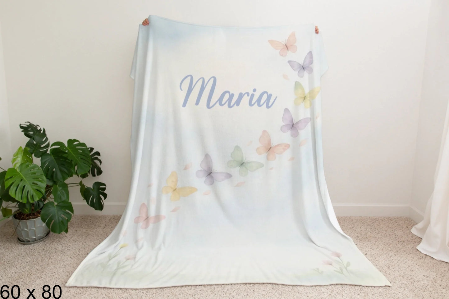 60x80_winter_wonderland_man_holding_velveteen_blanket_mockup