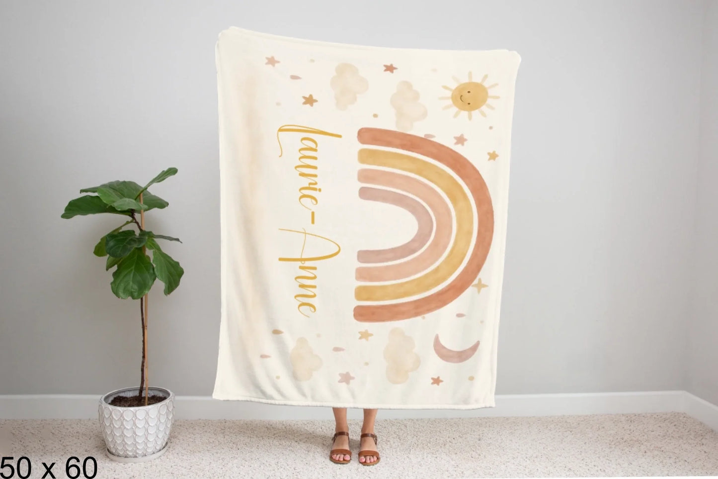 50x60_winter_wonderland_woman_holding_velveteen_blanket_mockup