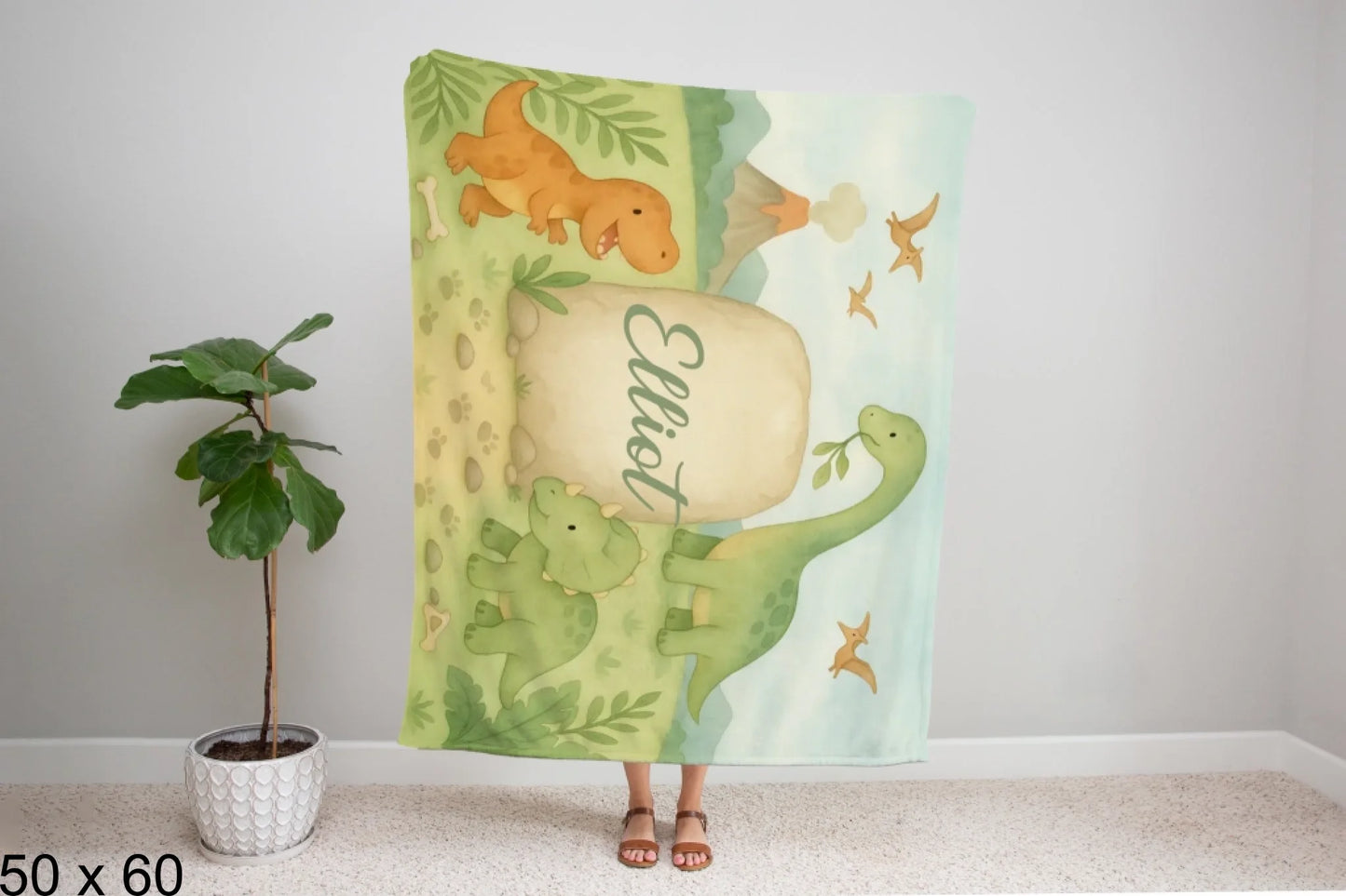 50x60_winter_wonderland_woman_holding_velveteen_blanket_mockup