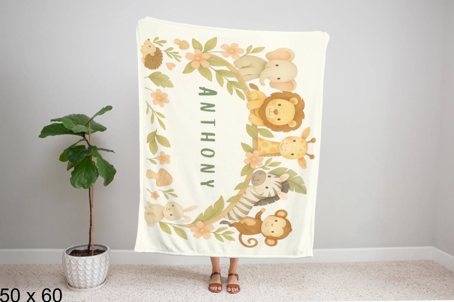 50x60_winter_wonderland_woman_holding_velveteen_blanket_mockup