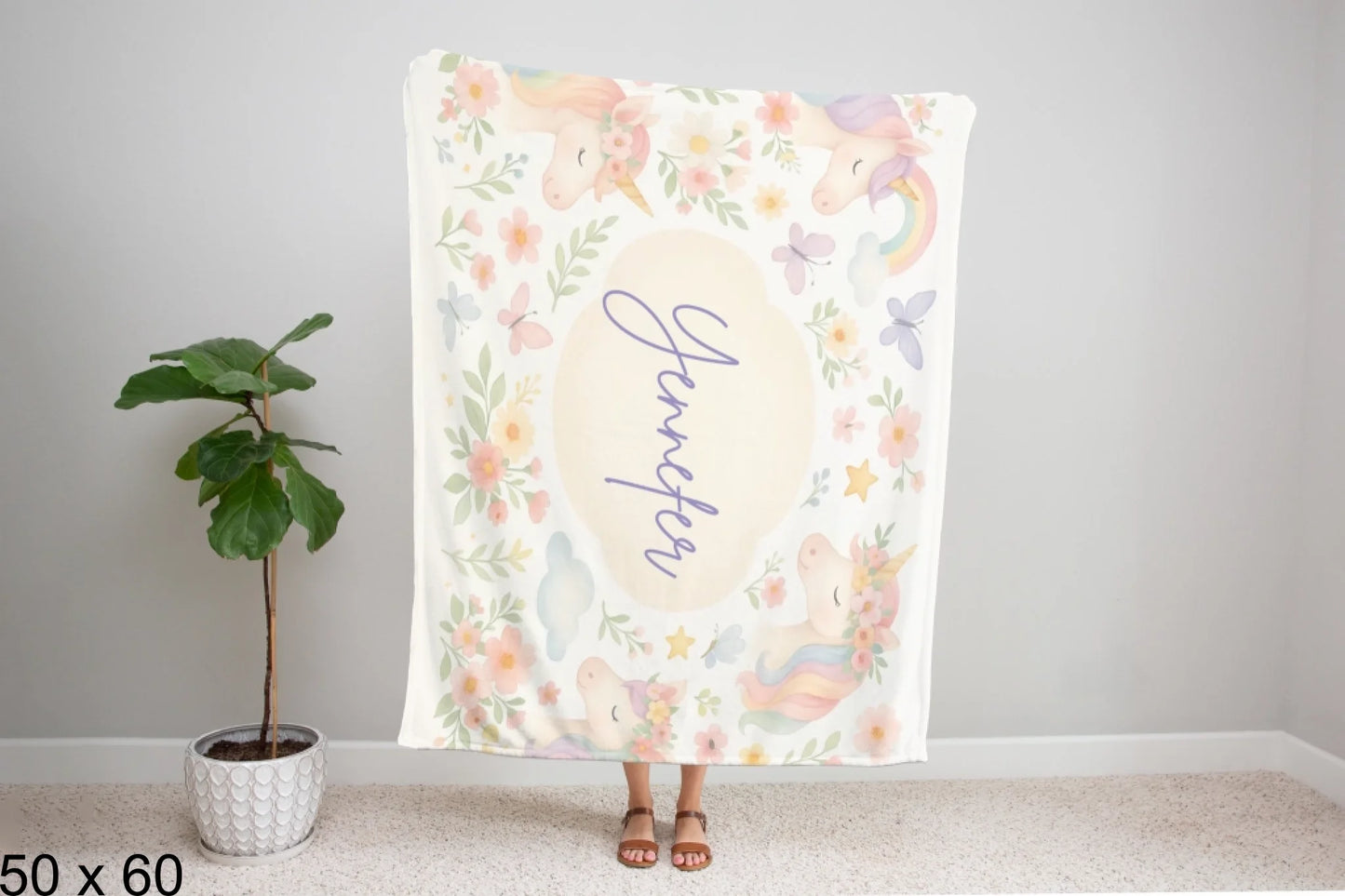 50x60_winter_wonderland_woman_holding_velveteen_blanket_mockup