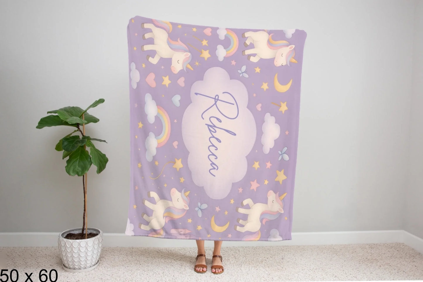 50x60_winter_wonderland_woman_holding_velveteen_blanket_mockup
