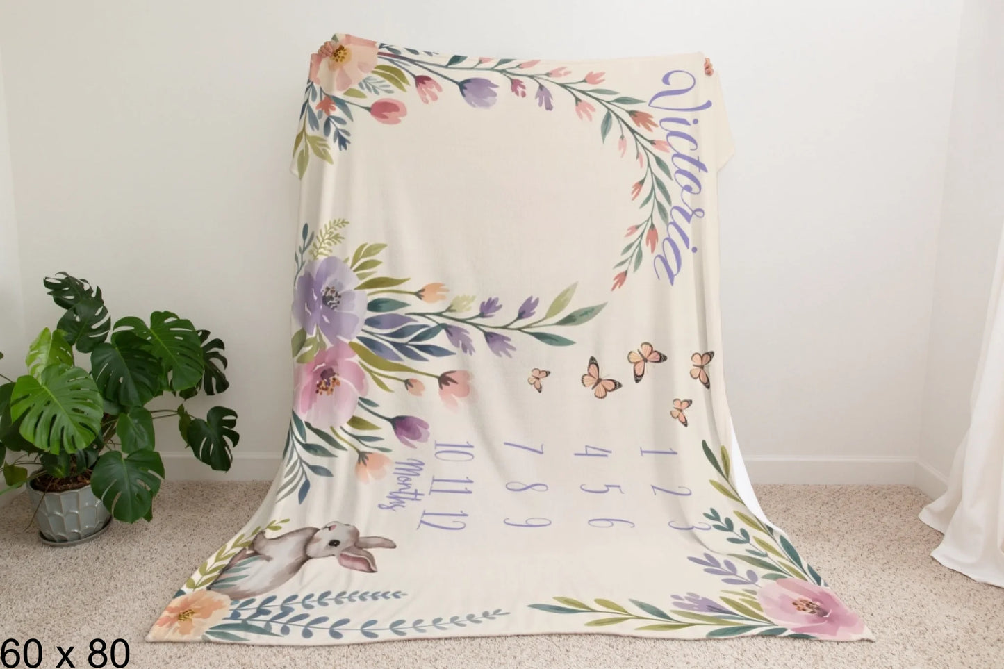 60x80_enchanted_forest_Man_Holding_Velveteen_Blanket_Mockup