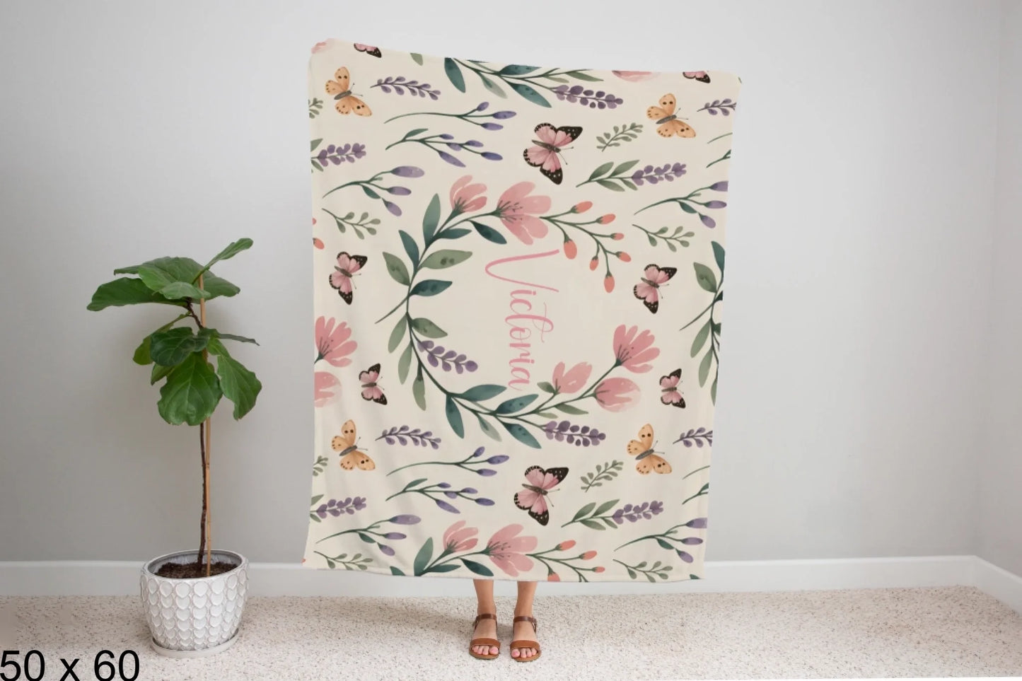 50x60_winter_wonderland_woman_holding_velveteen_blanket_mockup