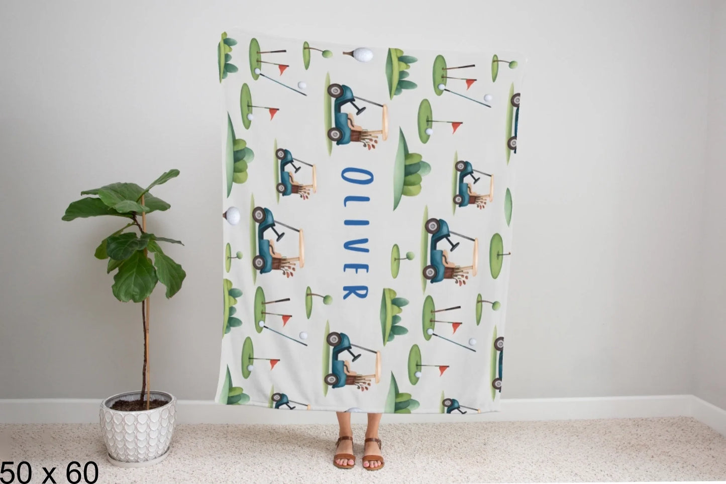 50x60_winter_wonderland_woman_holding_velveteen_blanket_mockup