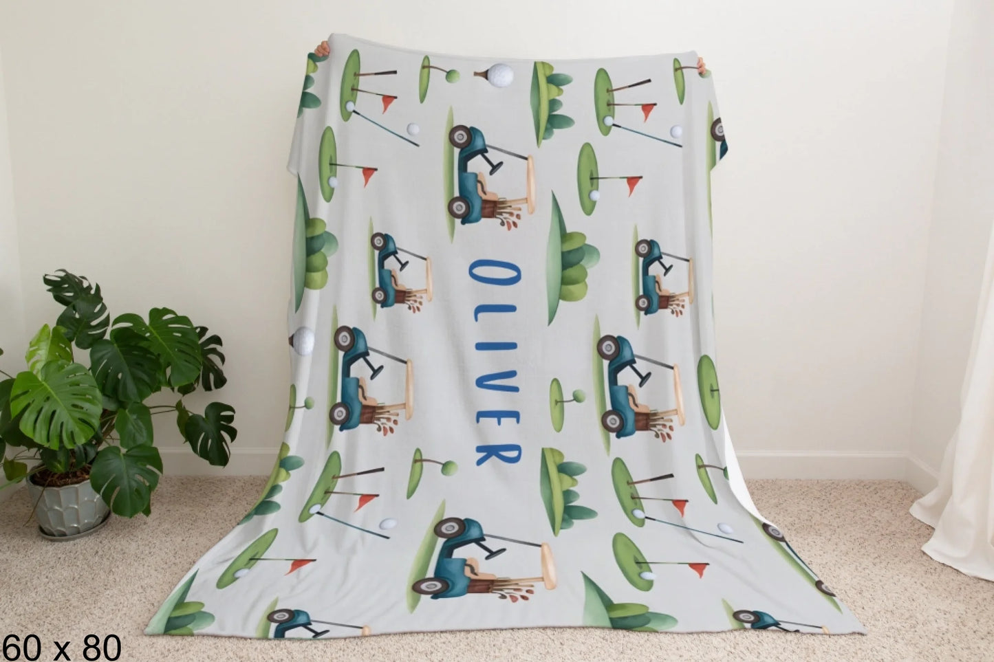 60x80_winter_wonderland_man_holding_velveteen_blanket_mockup