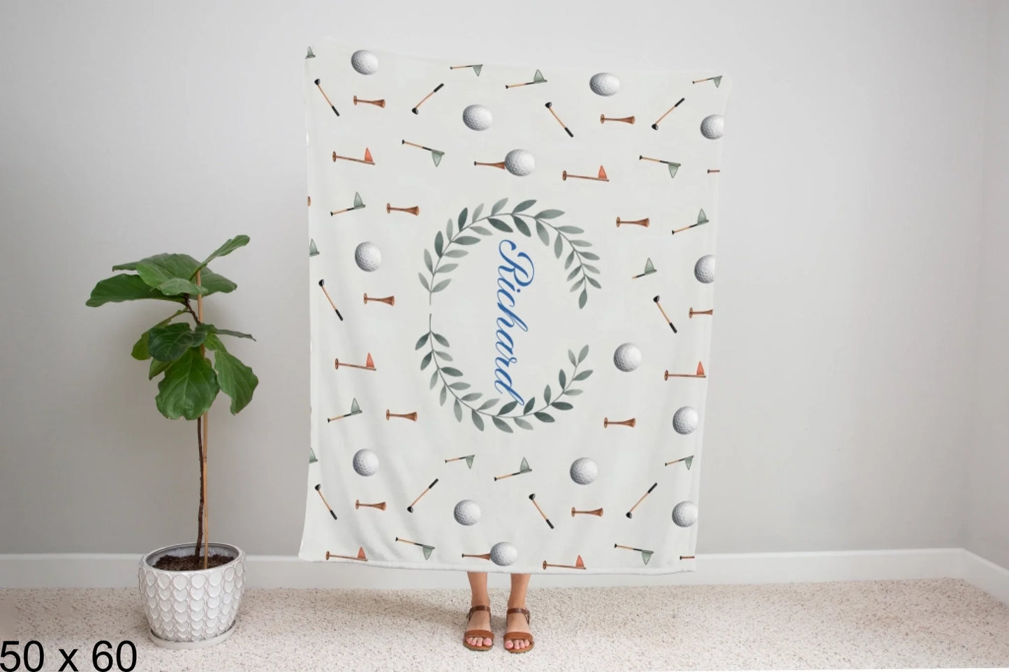 50x60_winter_wonderland_woman_holding_velveteen_blanket_mockup