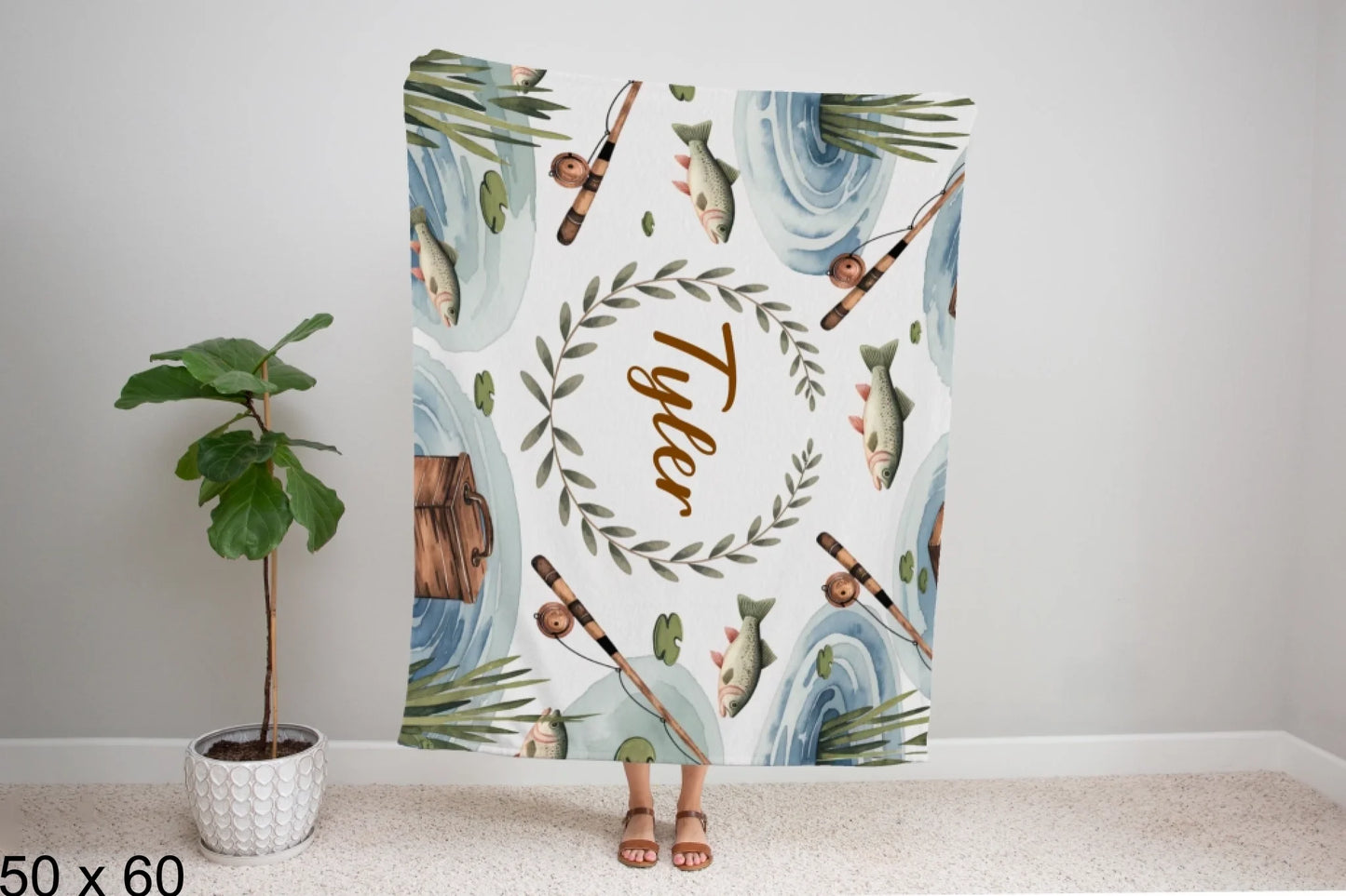 50x60_winter_wonderland_woman_holding_velveteen_blanket_mockup