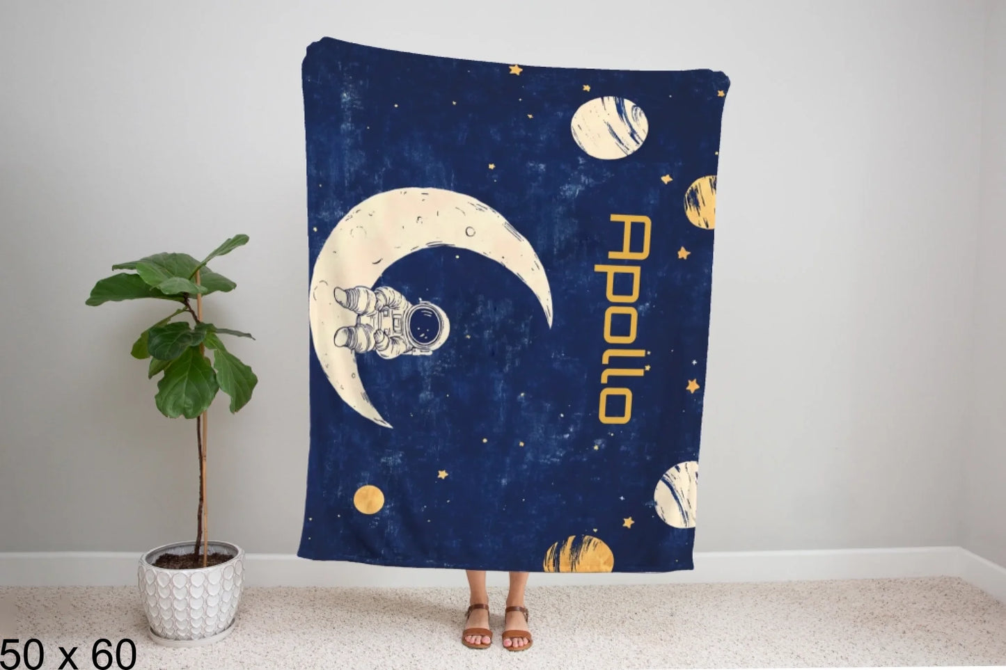 50x60_winter_wonderland_woman_holding_velveteen_blanket_mockup