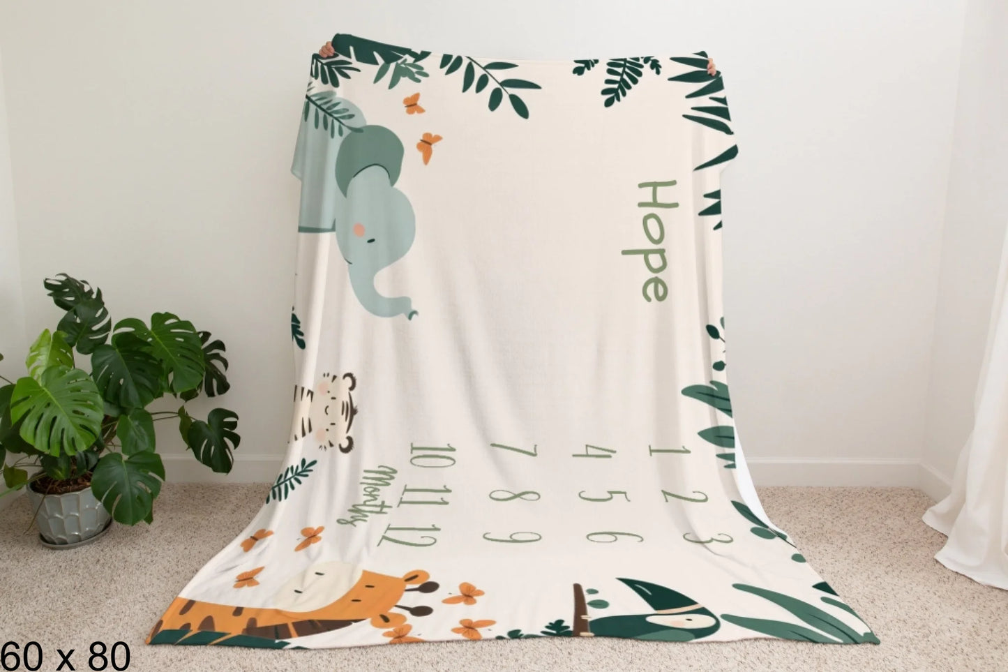 60x80_enchanted_forest_Man_Holding_Velveteen_Blanket_Mockup