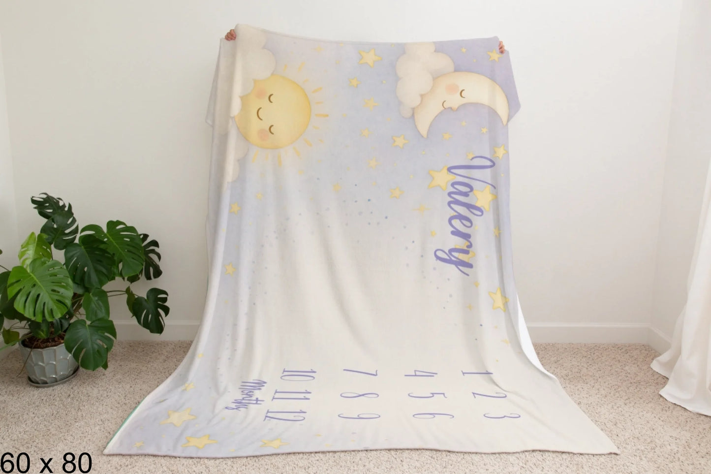60x80_enchanted_forest_Man_Holding_Velveteen_Blanket_Mockup