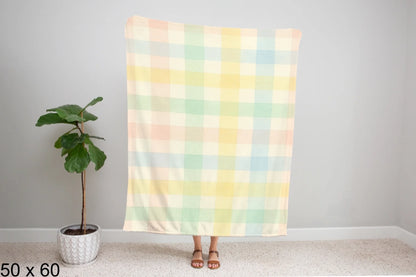 50x60_gingham_woman_holding_velveteen_blanket_mockup