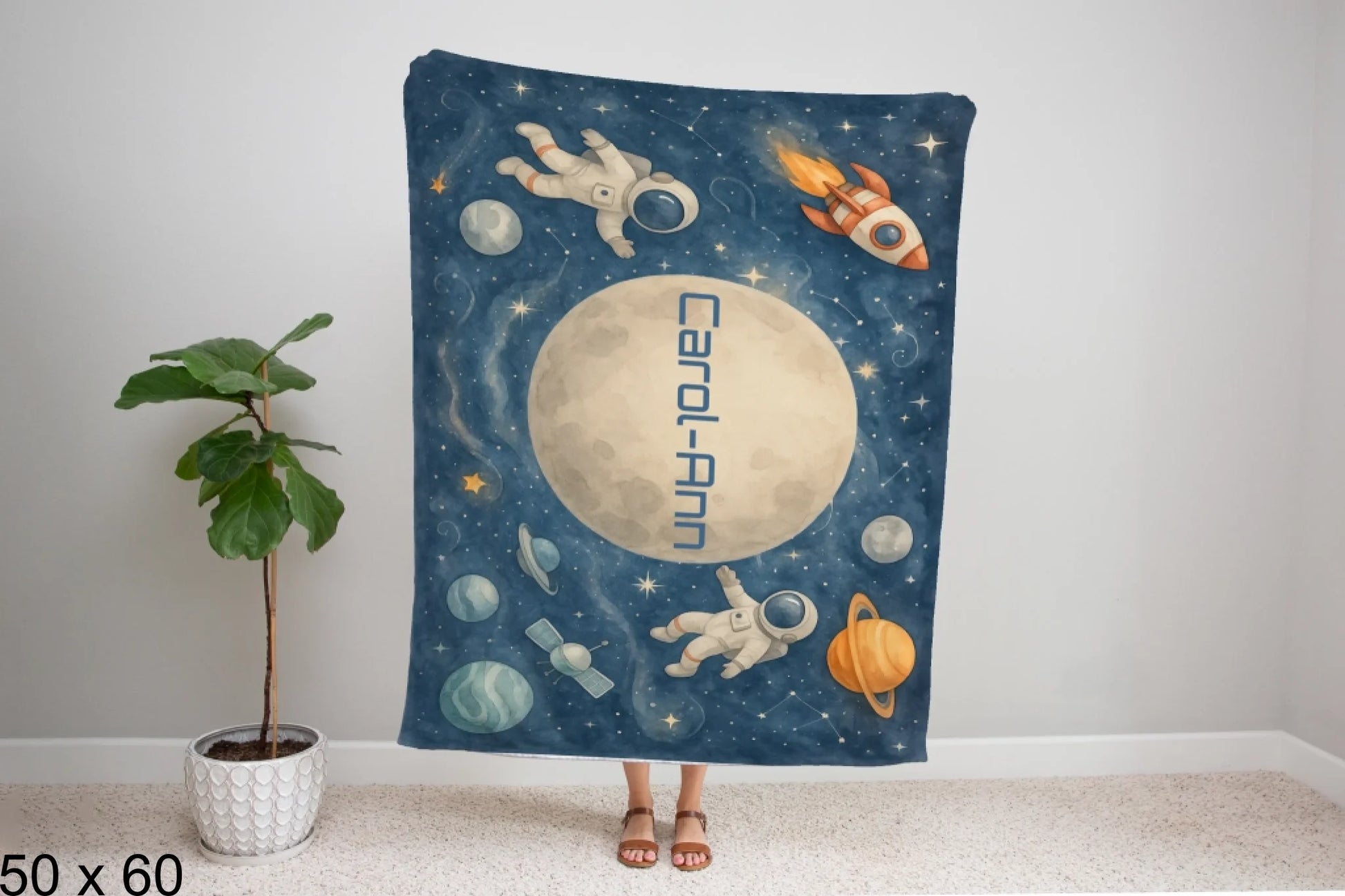 50x60_winter_wonderland_woman_holding_velveteen_blanket_mockup