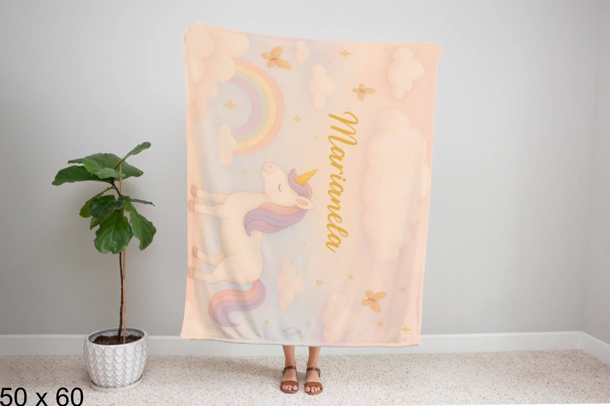 50x60_winter_wonderland_woman_holding_velveteen_blanket_mockup
