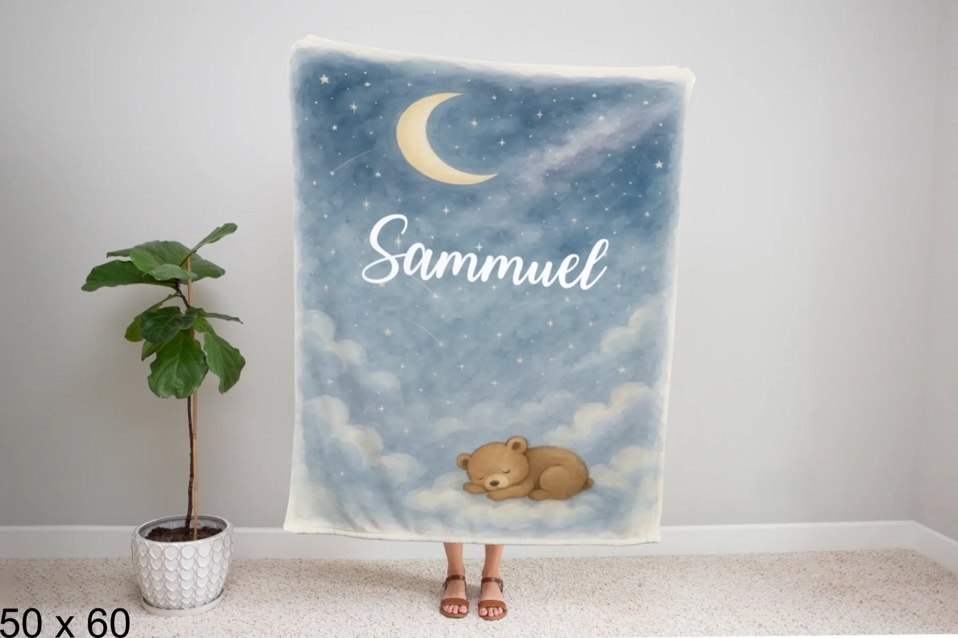 50x60_winter_wonderland_woman_holding_velveteen_blanket_mockup