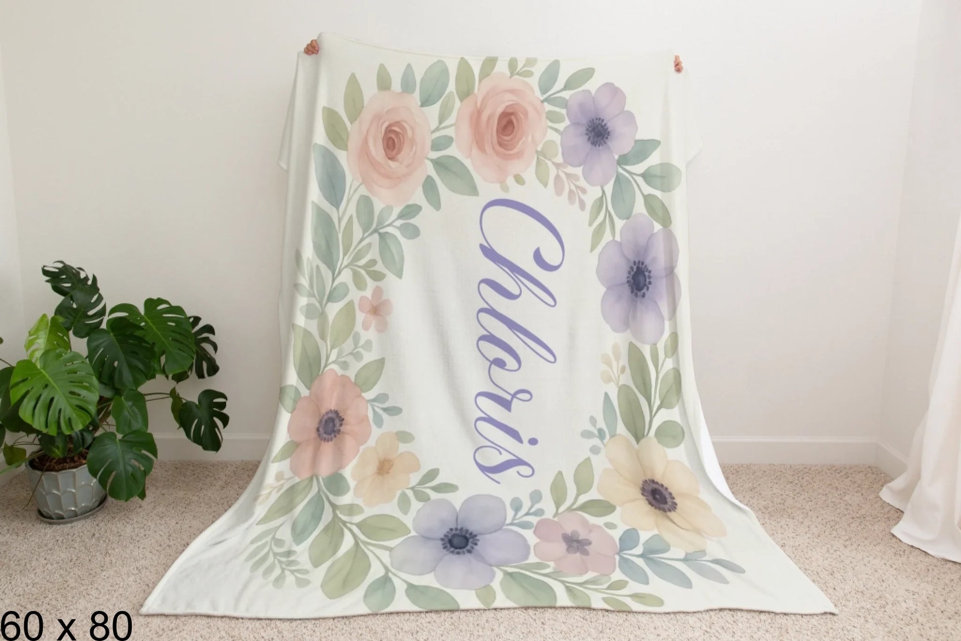 60x80_winter_wonderland_man_holding_velveteen_blanket_mockup