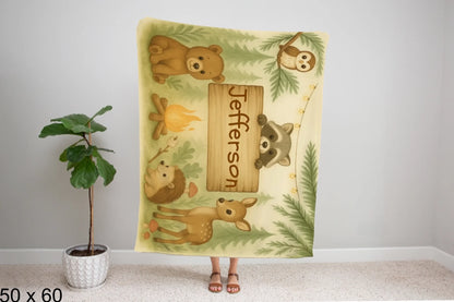 50x60_winter_wonderland_woman_holding_velveteen_blanket_mockup