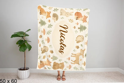 50x60_winter_wonderland_woman_holding_velveteen_blanket_mockup