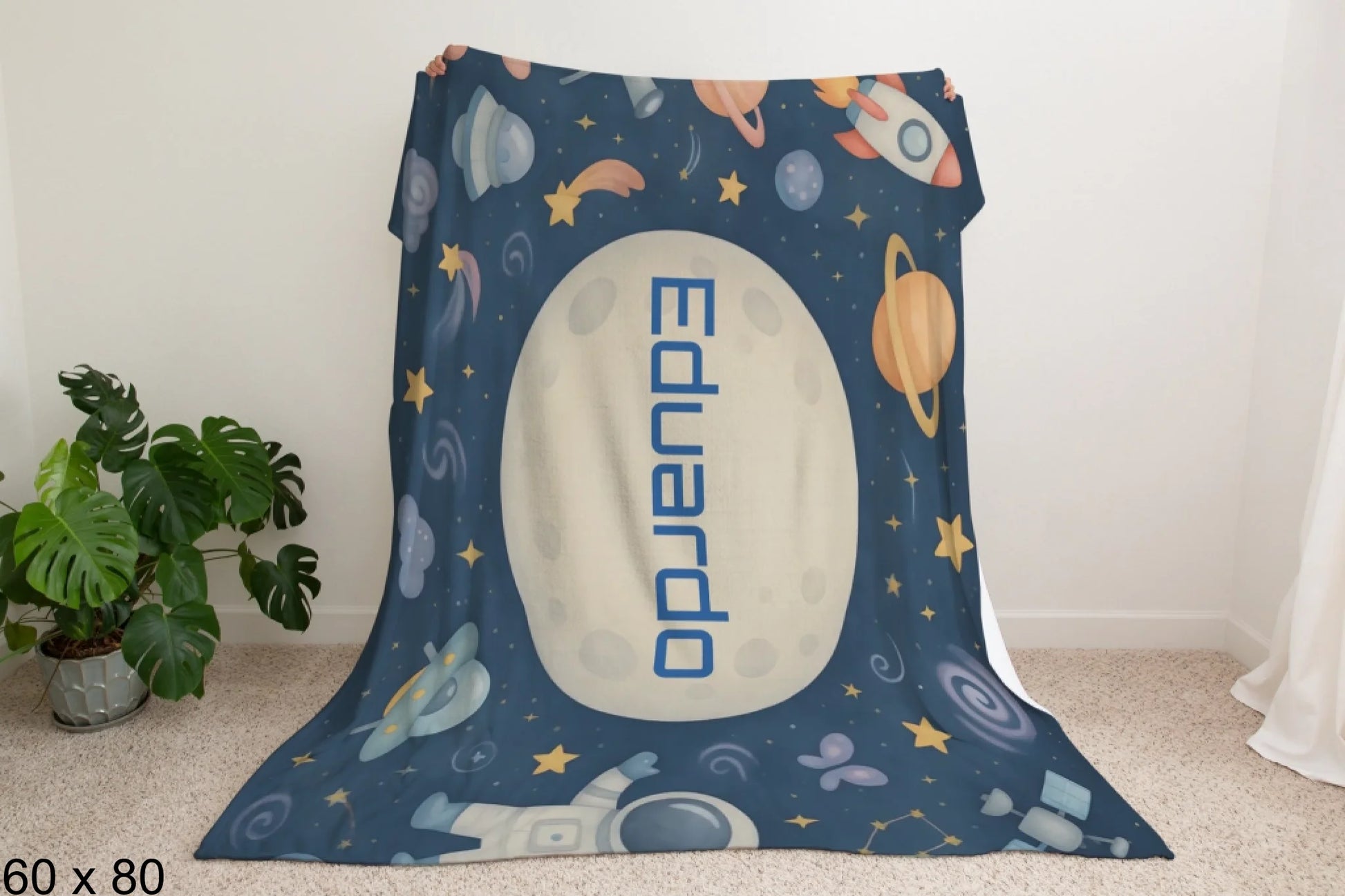 60x80_winter_wonderland_man_holding_velveteen_blanket_mockup