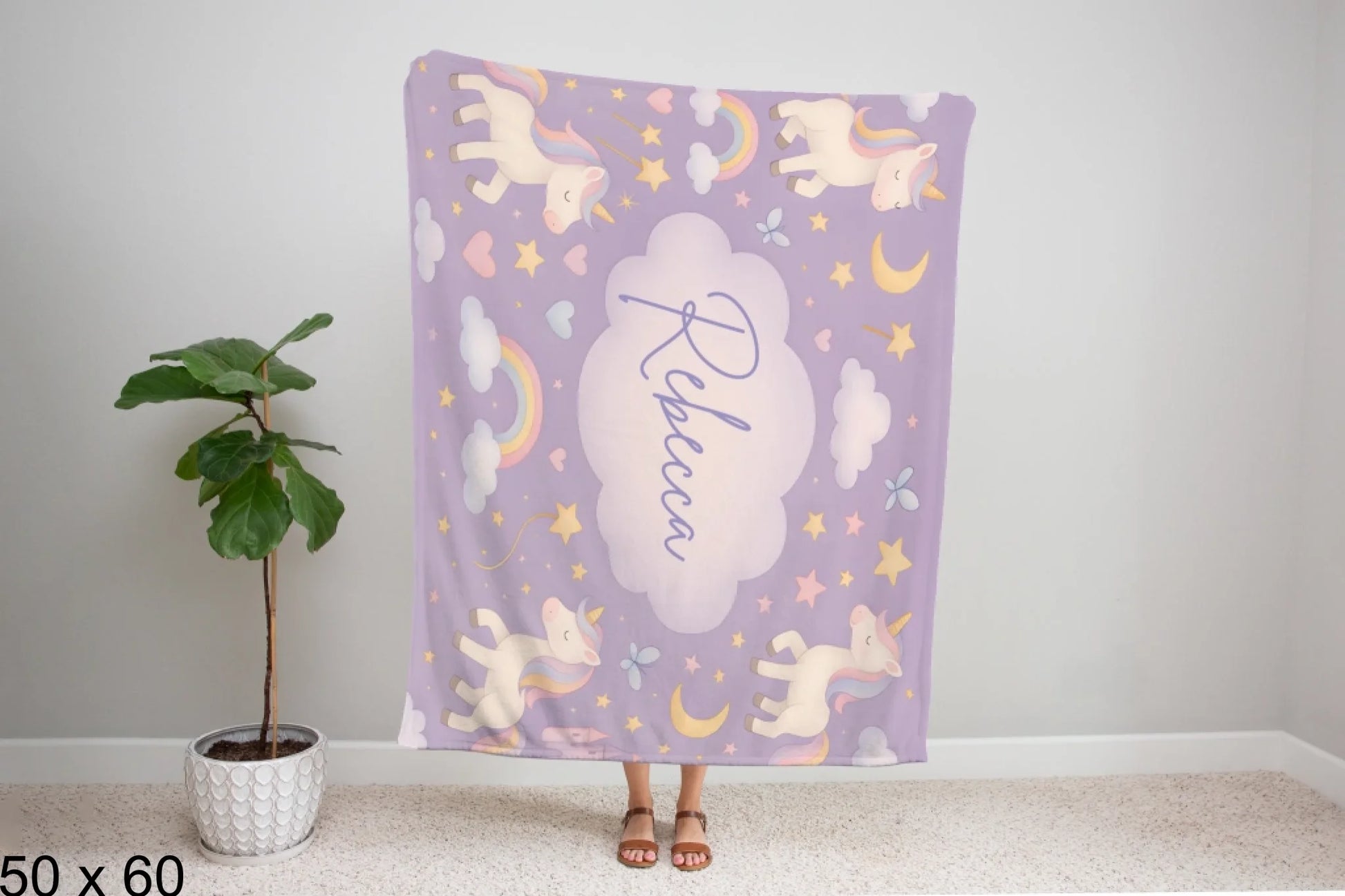 50x60_winter_wonderland_woman_holding_velveteen_blanket_mockup