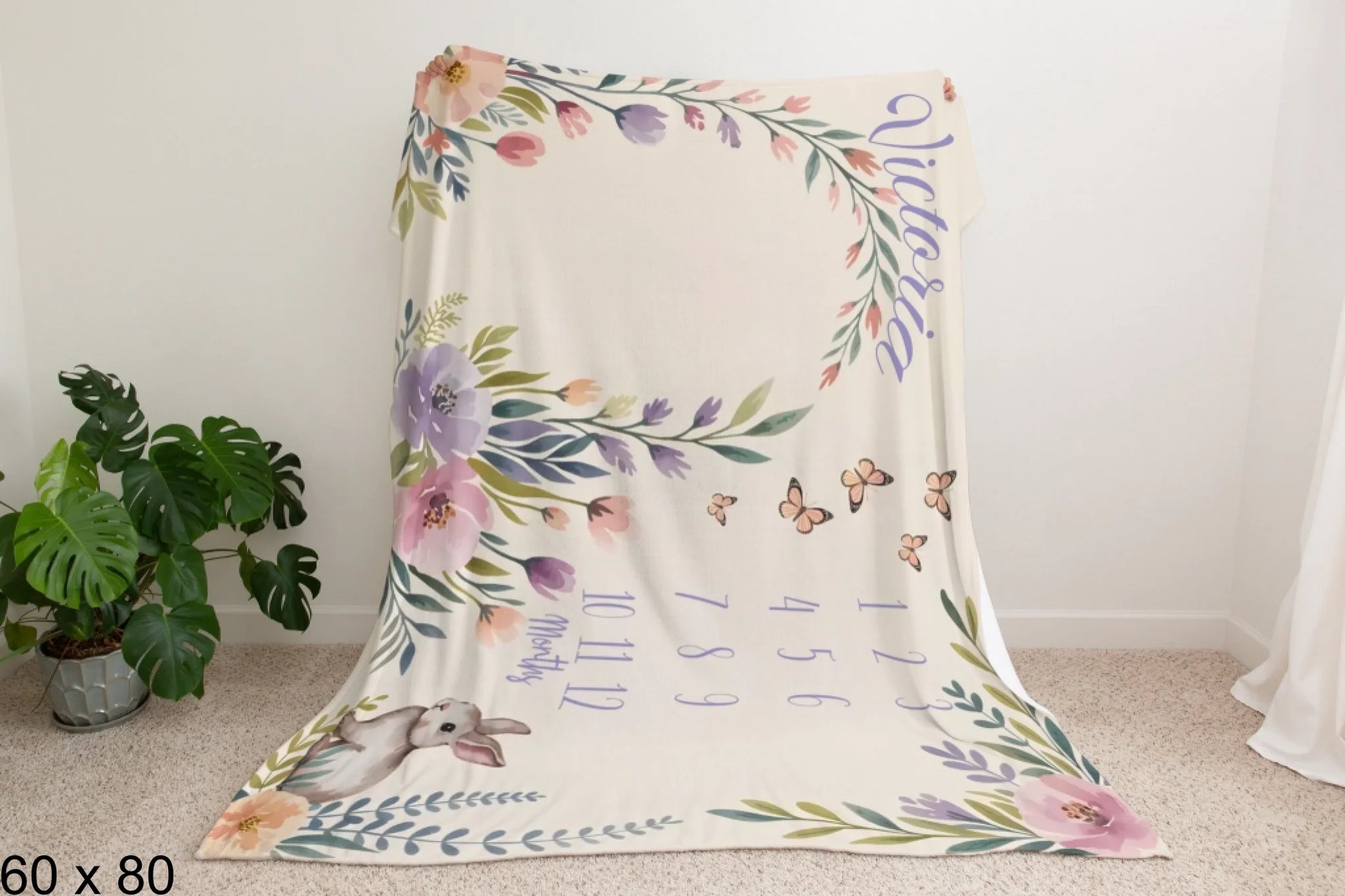 60x80_enchanted_forest_Man_Holding_Velveteen_Blanket_Mockup