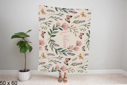 50x60_winter_wonderland_woman_holding_velveteen_blanket_mockup