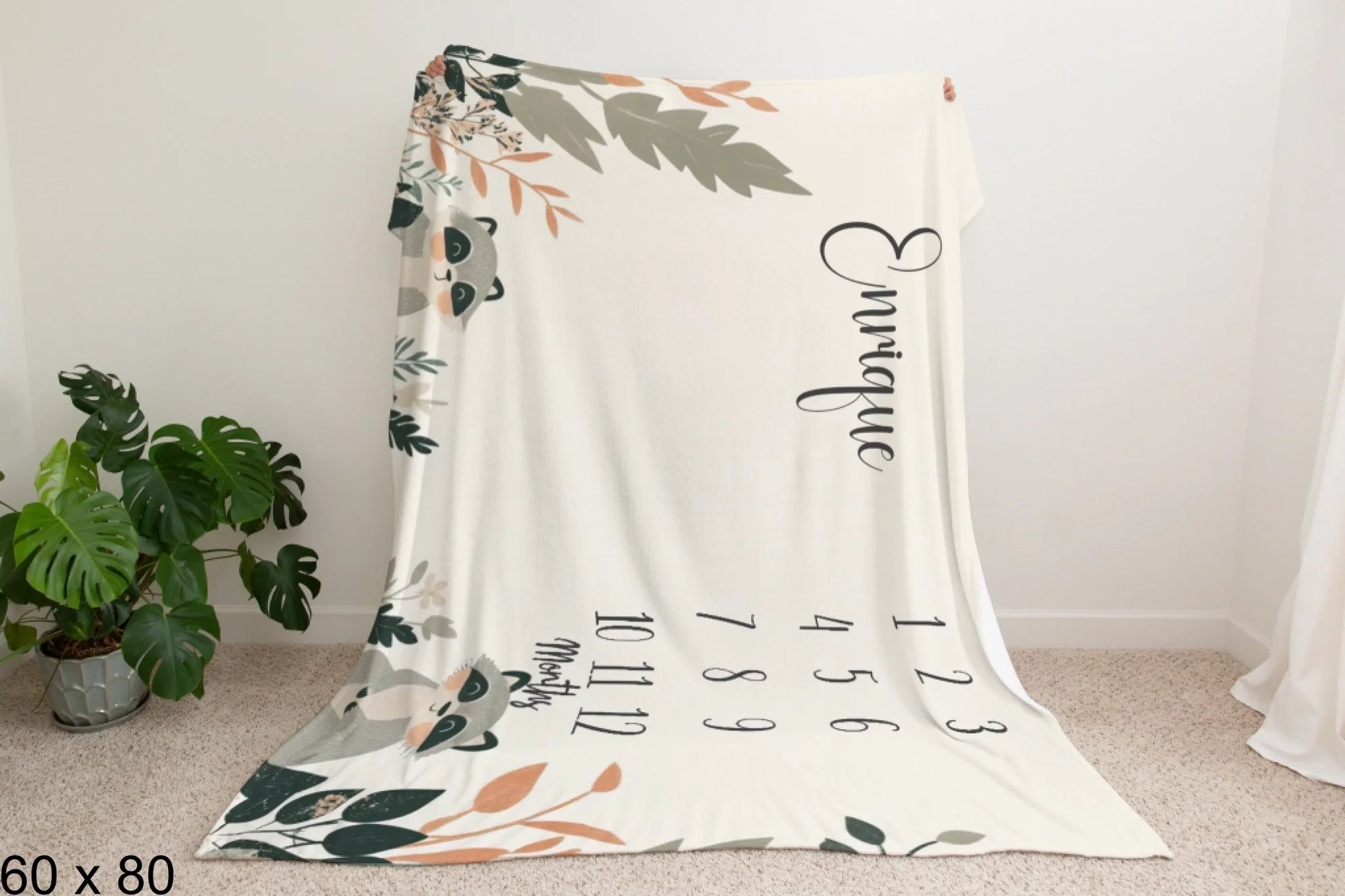 60x80_enchanted_forest_Man_Holding_Velveteen_Blanket_Mockup