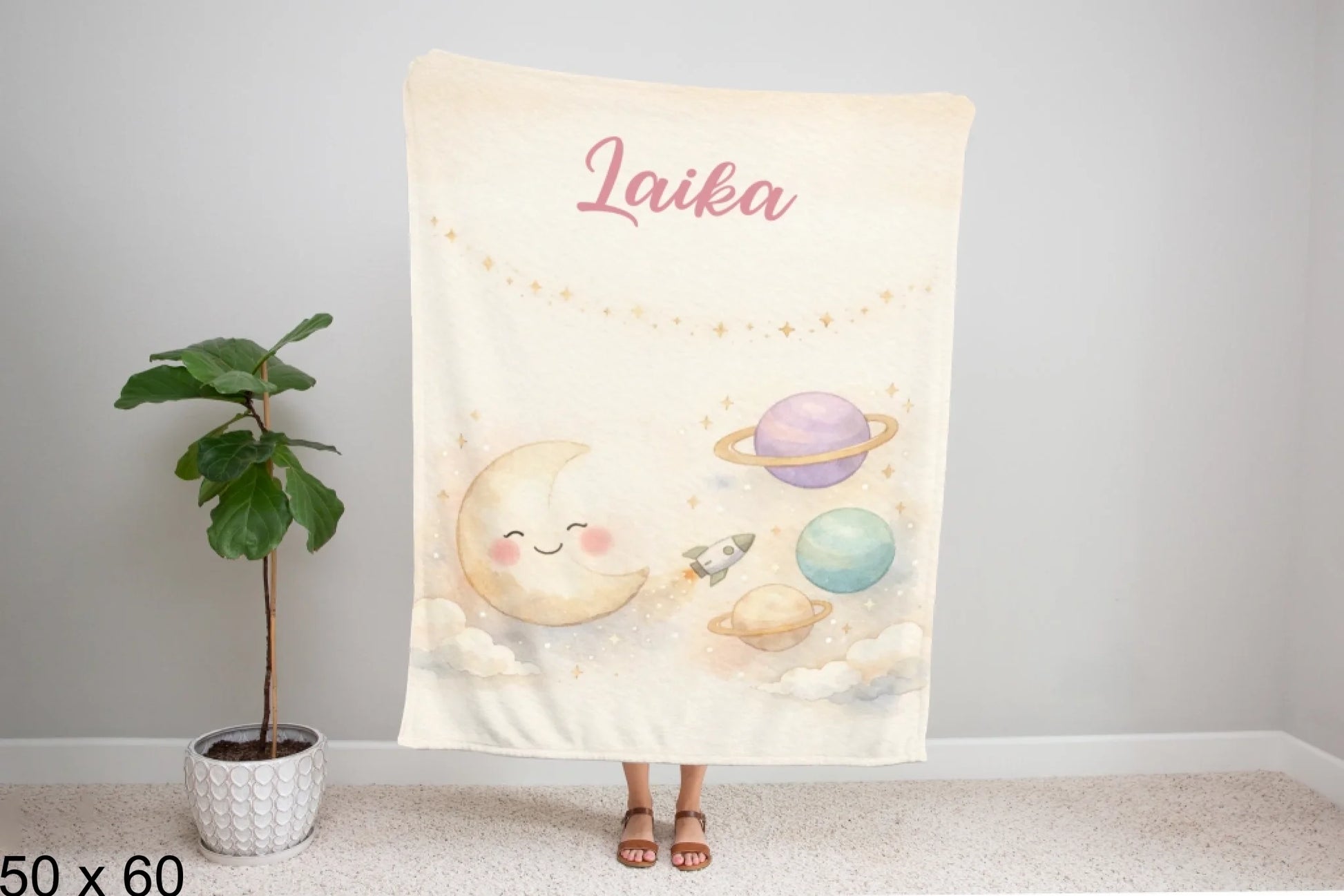 50x60_winter_wonderland_woman_holding_velveteen_blanket_mockup